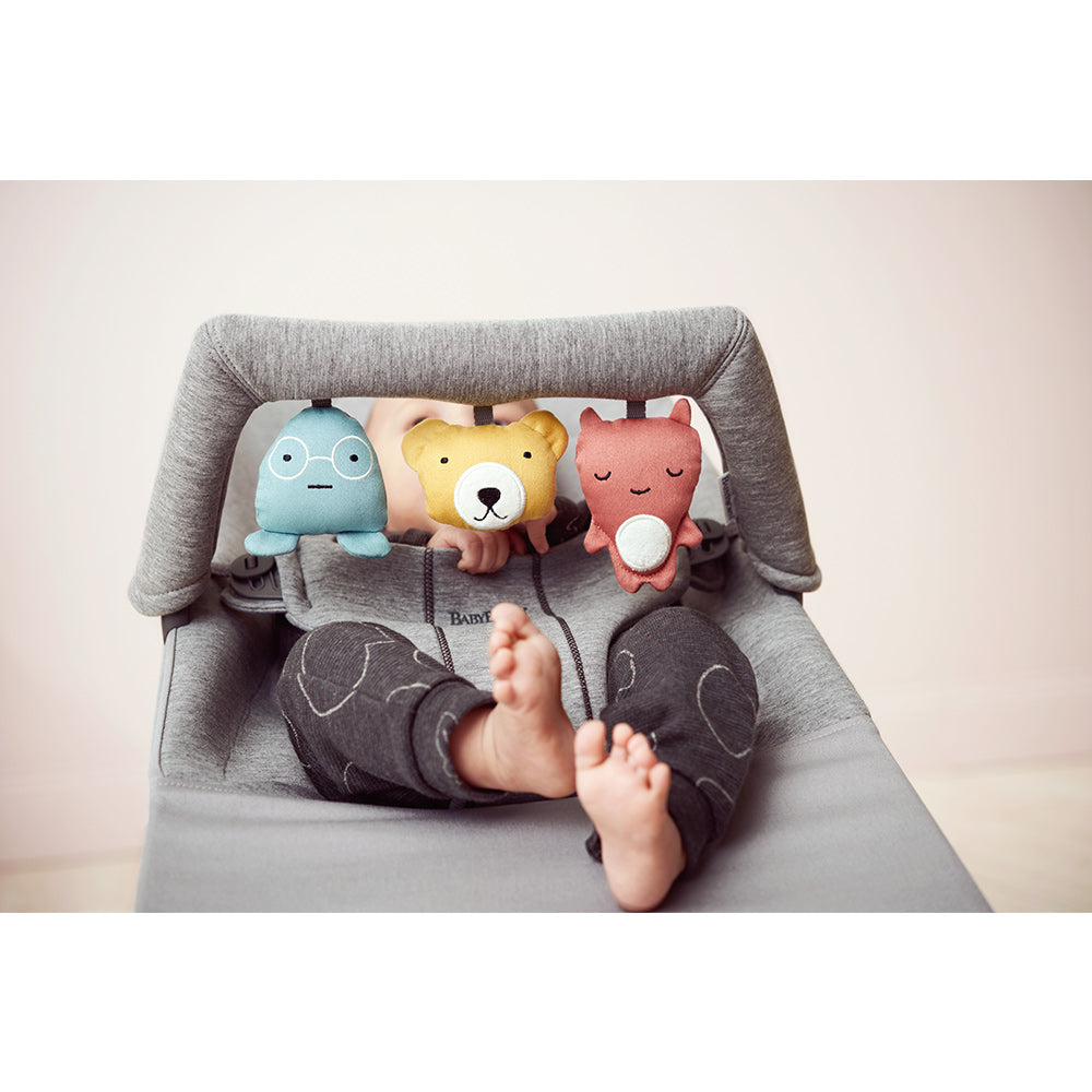 lower view of baby in BABYBJÖRN Bouncer Bliss with toys in -- Color_Light Gray 3D Jersey