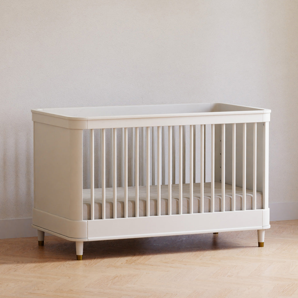 Namesake's Tanner 3-in-1 Convertible Crib in a room 