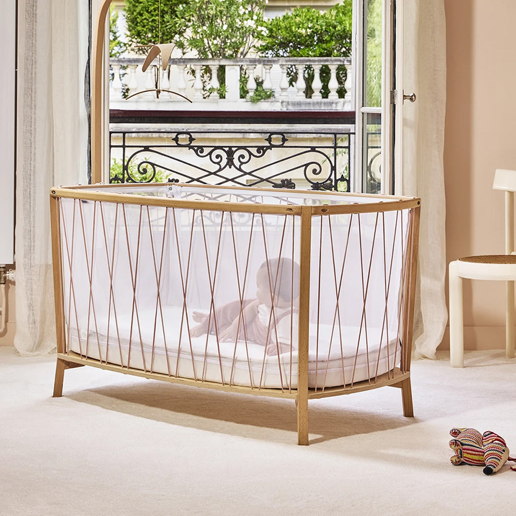 Charlie Crane KIMI Baby Bed with a baby inside  in -- Lifestyle