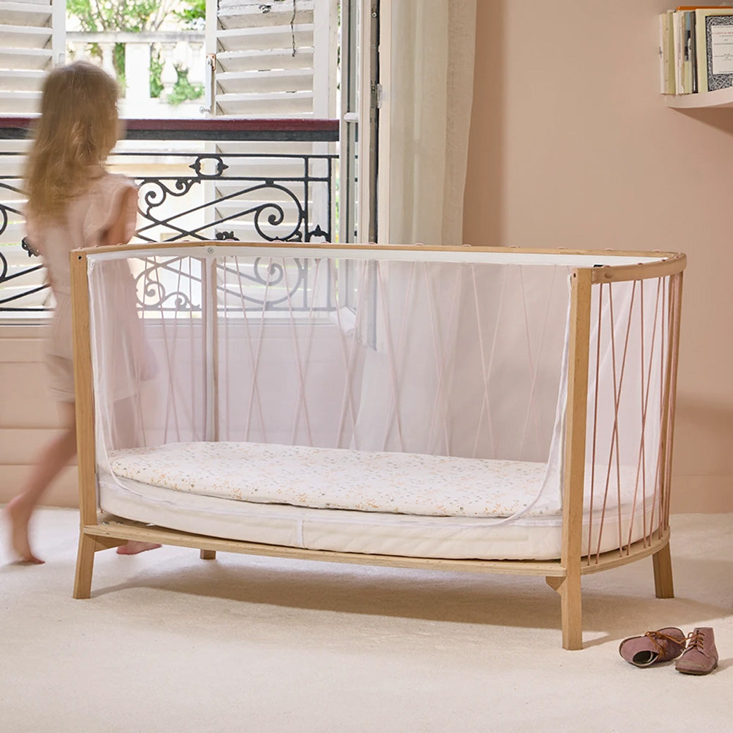 Charlie Crane KIMI Baby Bed as daybed next to a child  in -- Lifestyle