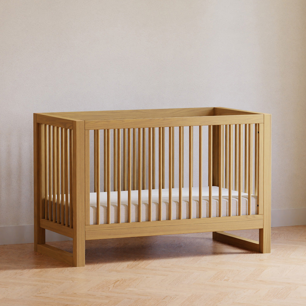 Namesake's Nantucket 3-in-1 Convertible Crib in the room in -- Color_Honey