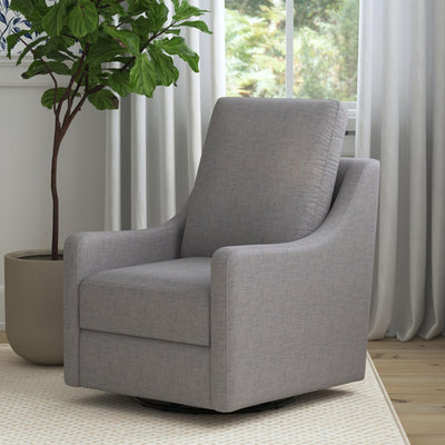 The DaVinci Field Swivel Glider next to a plant in --Color_Misty Grey