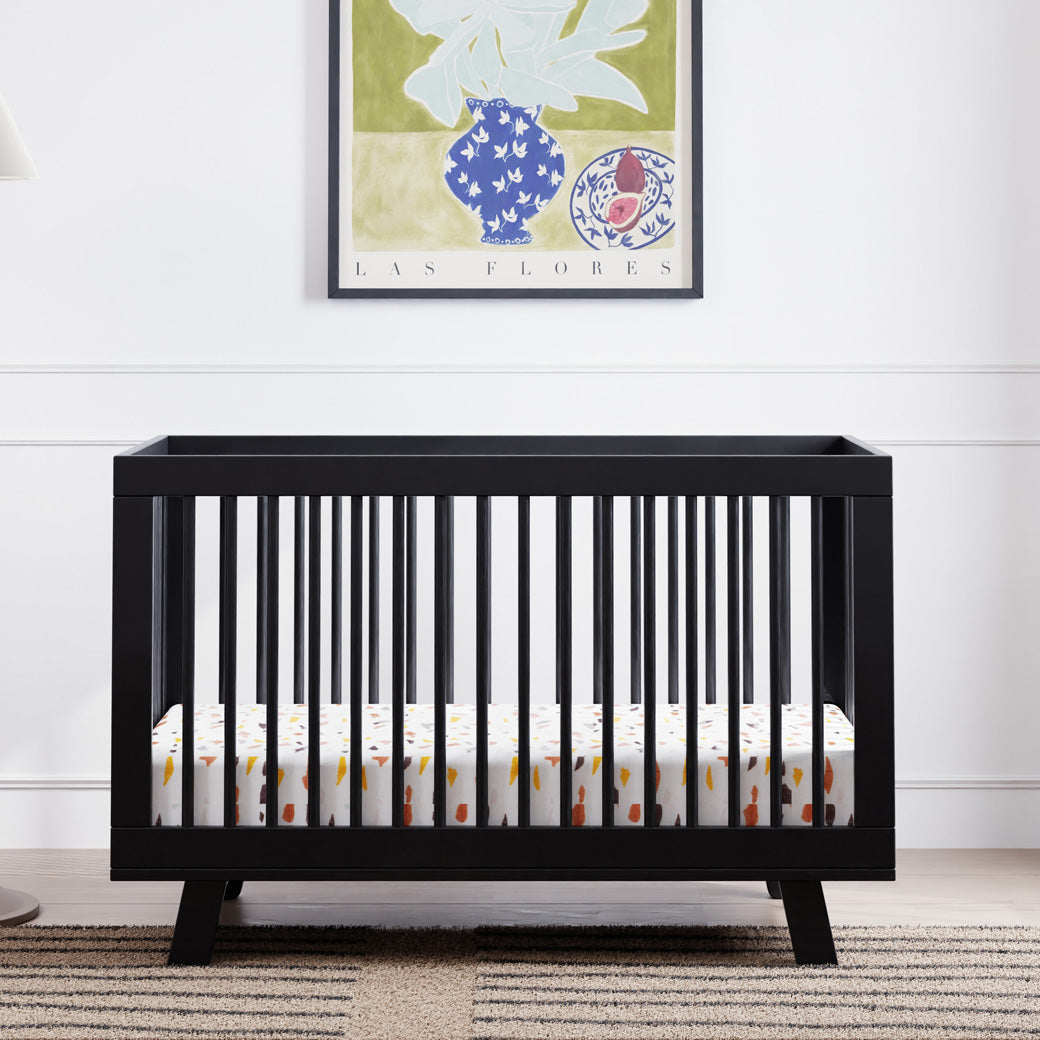 Front view of Babyletto Hudson 3-in-1 Crib under a picture  in -- Color_Black