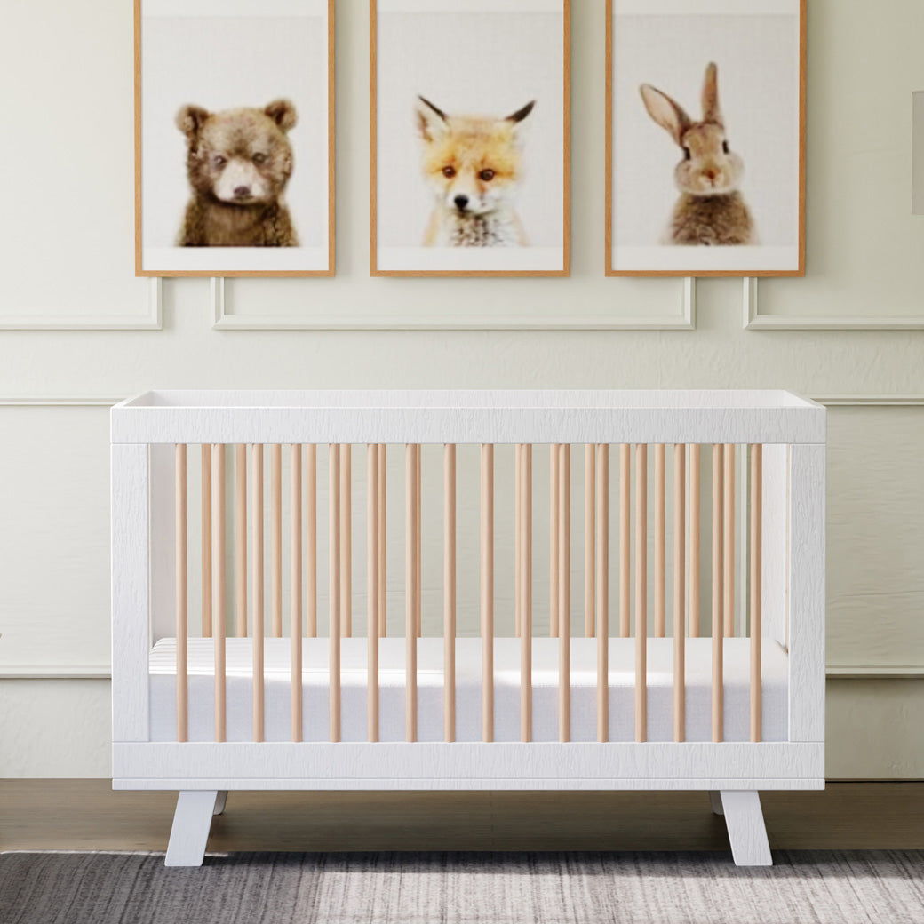 Front view of Babyletto Hudson 3-in-1 Crib under pictures of baby animals in -- Color_Washed Natural/White