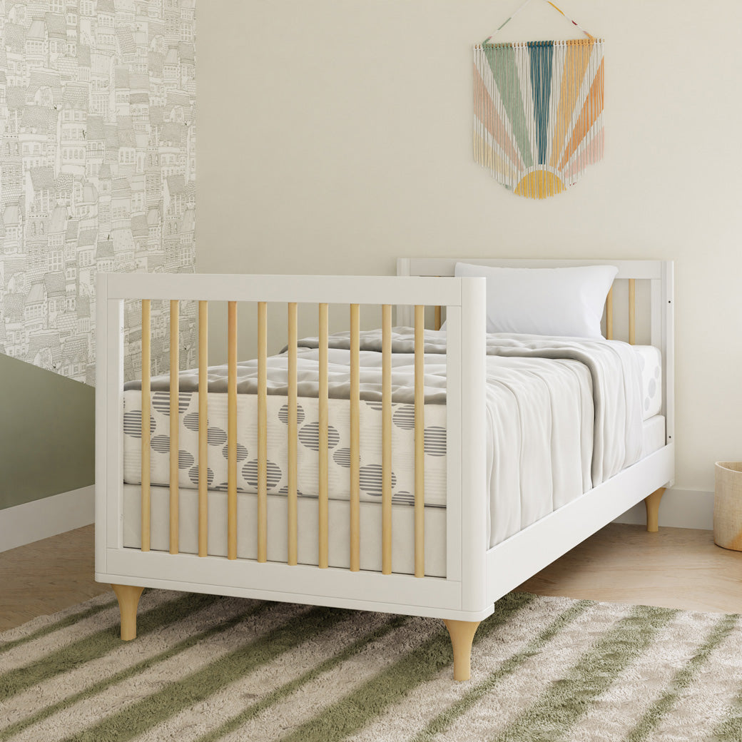 The Babyletto Lolly 4-in-1 Convertible Mini Crib as a full-size bed in -- Color_White / Natural