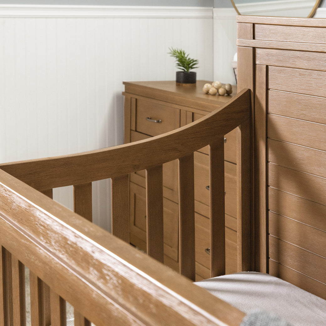 Closeup of Namesake's Wesley Farmhouse Storage Crib rails in -- Color_Stablewood