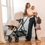 Two Children Riding in Convertible UPPAbaby VISTA V2 Stroller