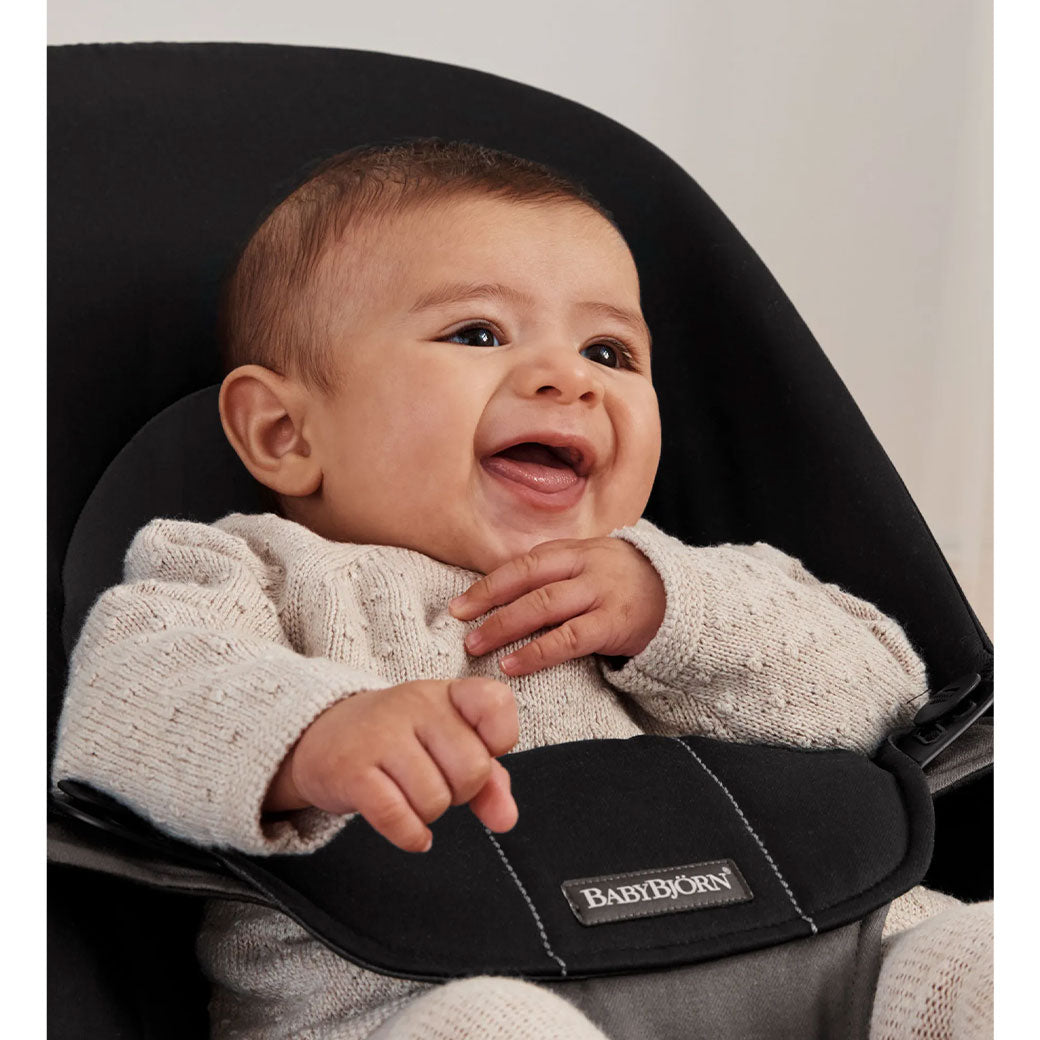 Closeup of baby in Baby in BABYBJÖRN Bouncer Balance Soft in -- Color_Black/Dark Grey Woven