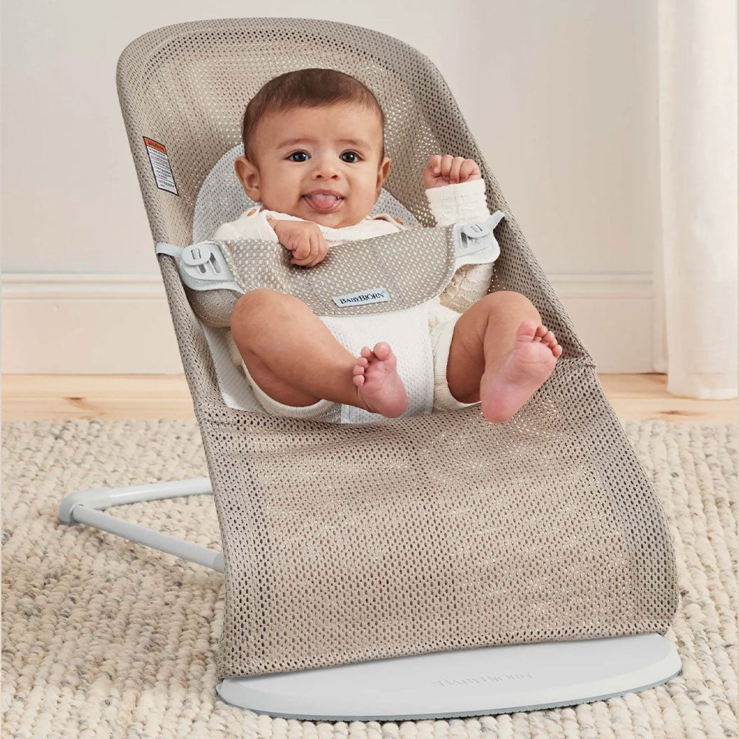 Baby sitting in BABYBJÖRN Bouncer Balance Soft in -- Color_Grey Beige/White Mesh