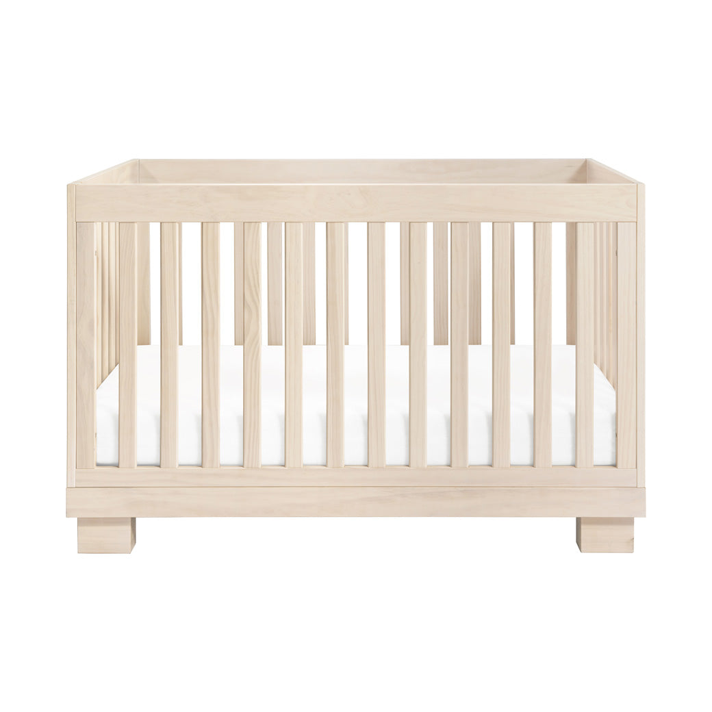 Front view of Babyletto Modo 3-in-1 Convertible Crib with Toddler Bed Conversion Kit in -- Color_Washed Natural