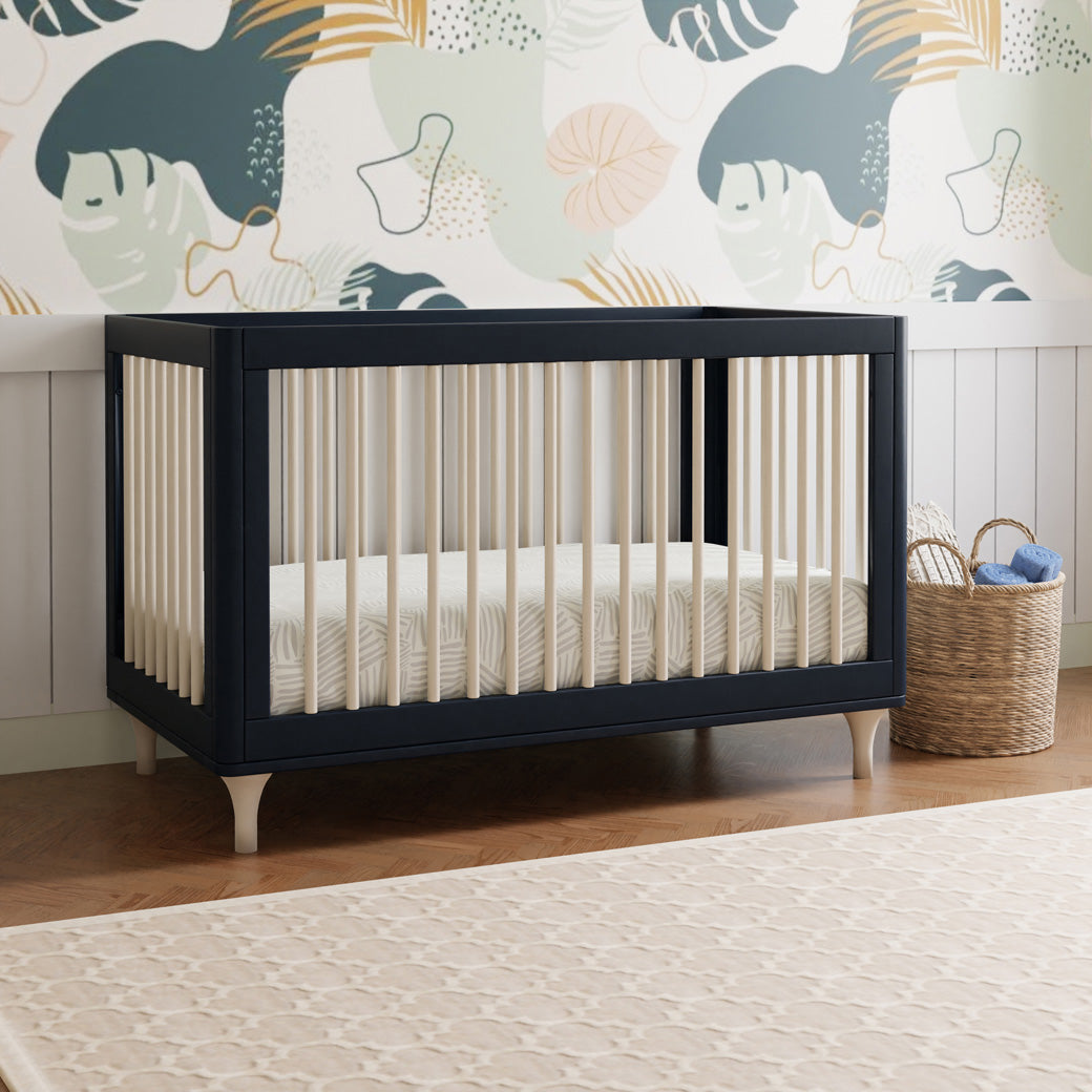 The Babyletto Lolly 3-in-1 Crib in a colorful room  in -- Color_Navy