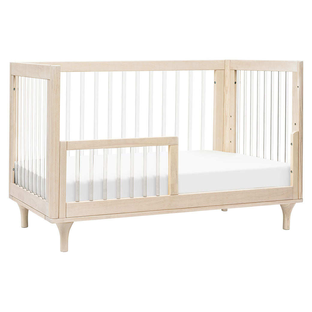 The Babyletto Lolly 3-in-1 Convertible Crib as toddler bed in -- Color_Washed Natural / Acrylic