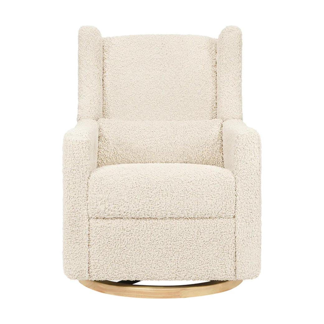 Front view of Babyletto Kiwi Glider Recliner in -- Color_Almond Teddy Loop with Light Wood Base