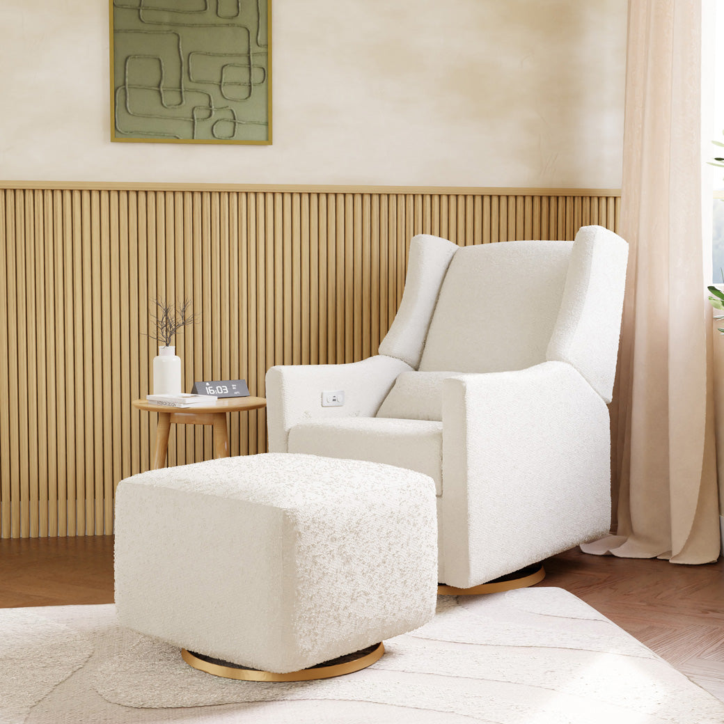 Side view of Babyletto Kiwi Glider Recliner with an ottoman with an ottoman and coffee table in -- Color_Ivory Boucle with Gold Base