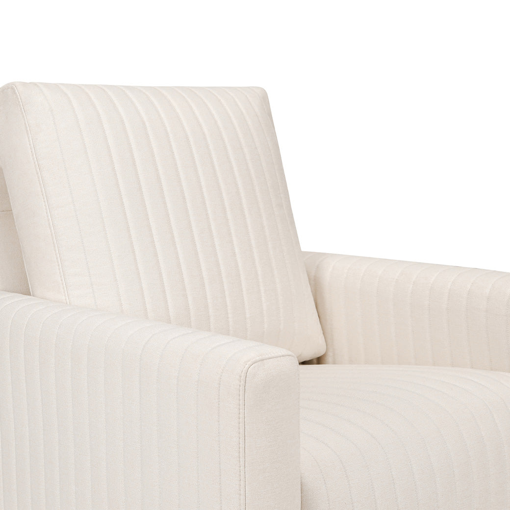 Closeup of Babyletto Poe Channeled Swivel Glider in -- Color_Performance Cream Eco-Weave with Dark Wood Base