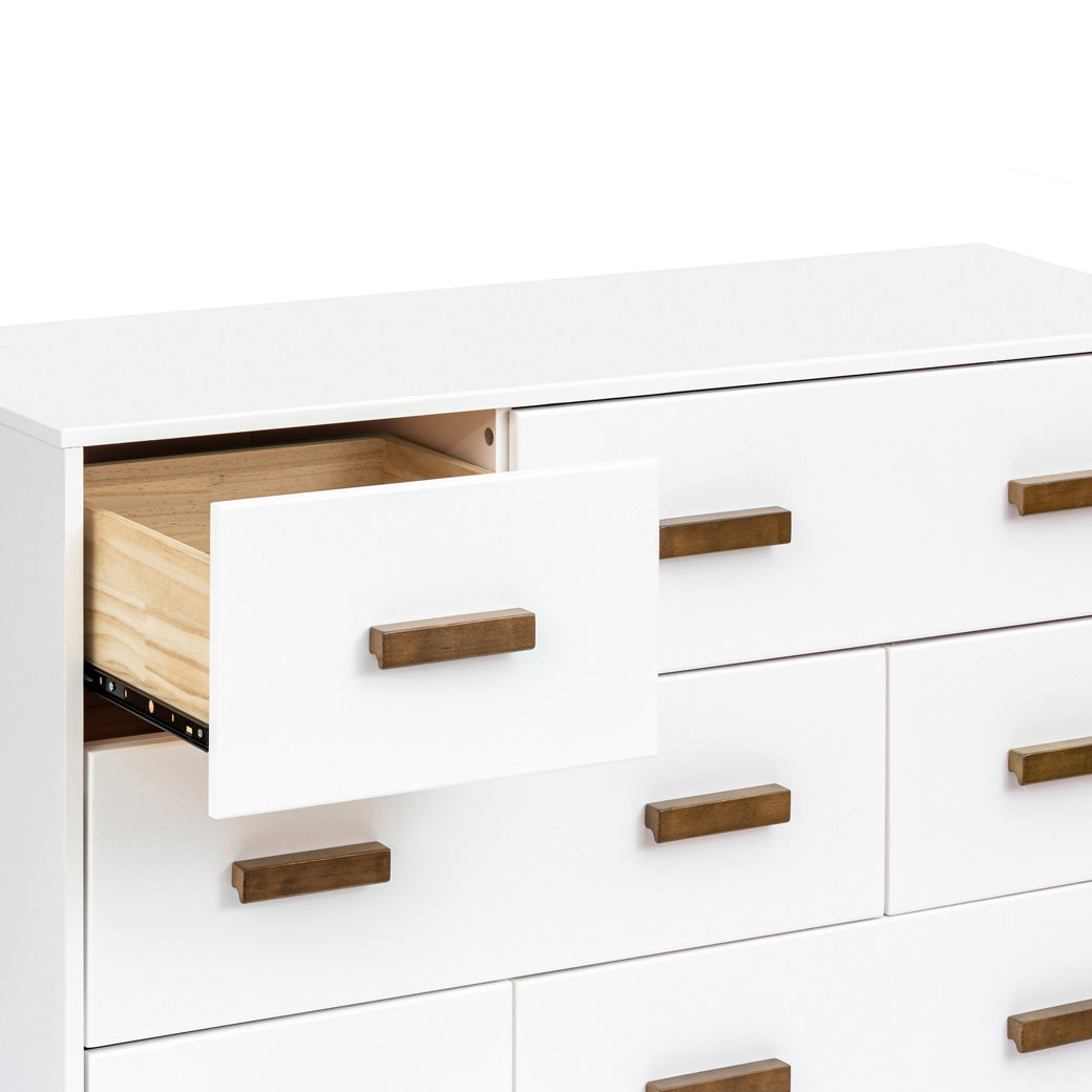 Babyletto Scoot 6-Drawer Dresser with left drawer opened in -- Color_White / Natural Walnut