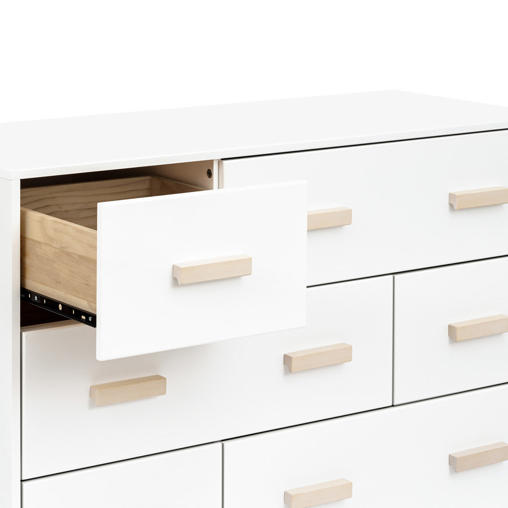 Babyletto Scoot 6-Drawer Dresser with left drawer open in -- Color_White / Washed Natural