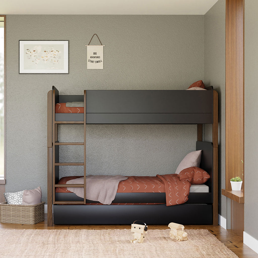Front view of Babyletto's Universal Twin Storage Trundle Bed in a kids room in -- Color_Black