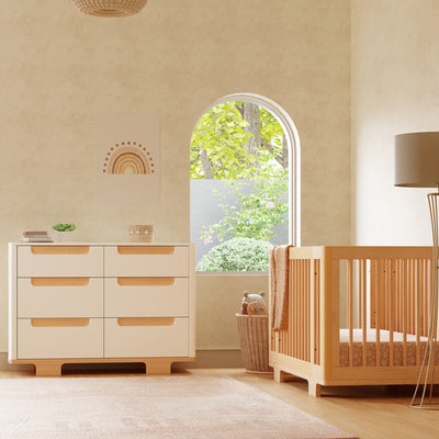 Babyletto Yuzu 6-Drawer Dresser next a window and crib  in -- Color_White / Natural