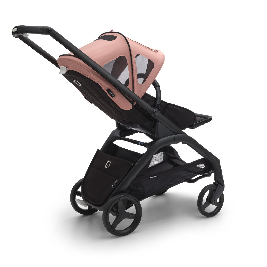 Bugaboo Dragonfly Breezy Sun Canopy on a stroller with the second layer spread out in -- Color_Morning Pink