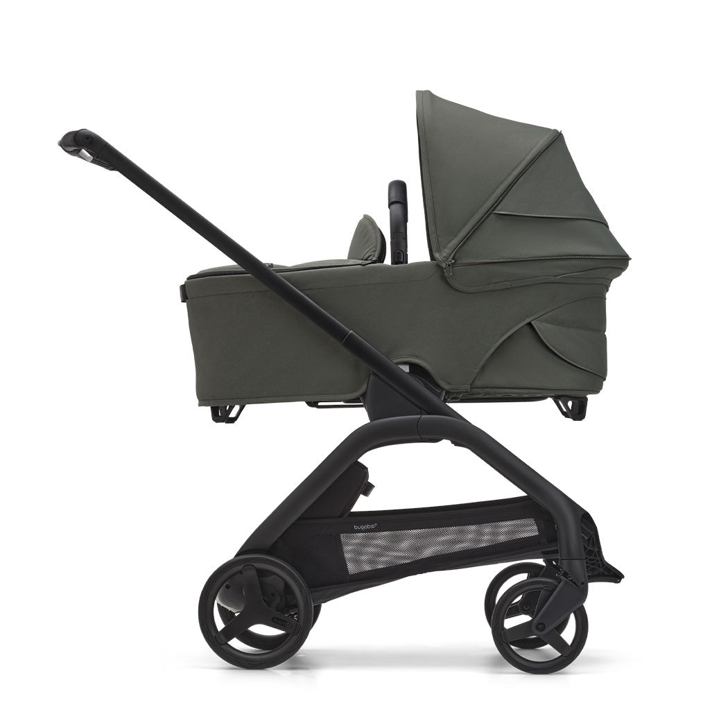 Side view of Bugaboo Dragonfly Stroller With Bassinet in -- Color_Forest Green