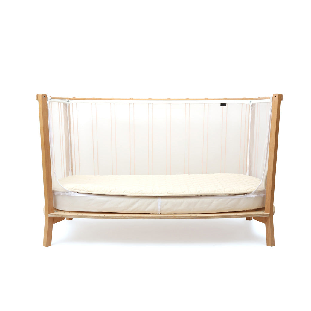 Front view of Charlie Crane KIMI Baby Bed as daybed in -- Color_Bois de Rose