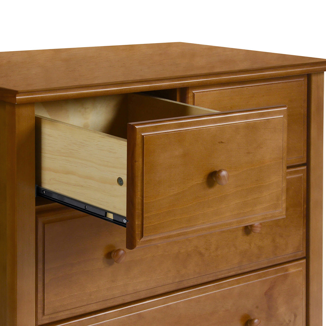 Closeup of DaVinci Autumn 4-Drawer Dresser with open drawer in -- Color_Chestnut