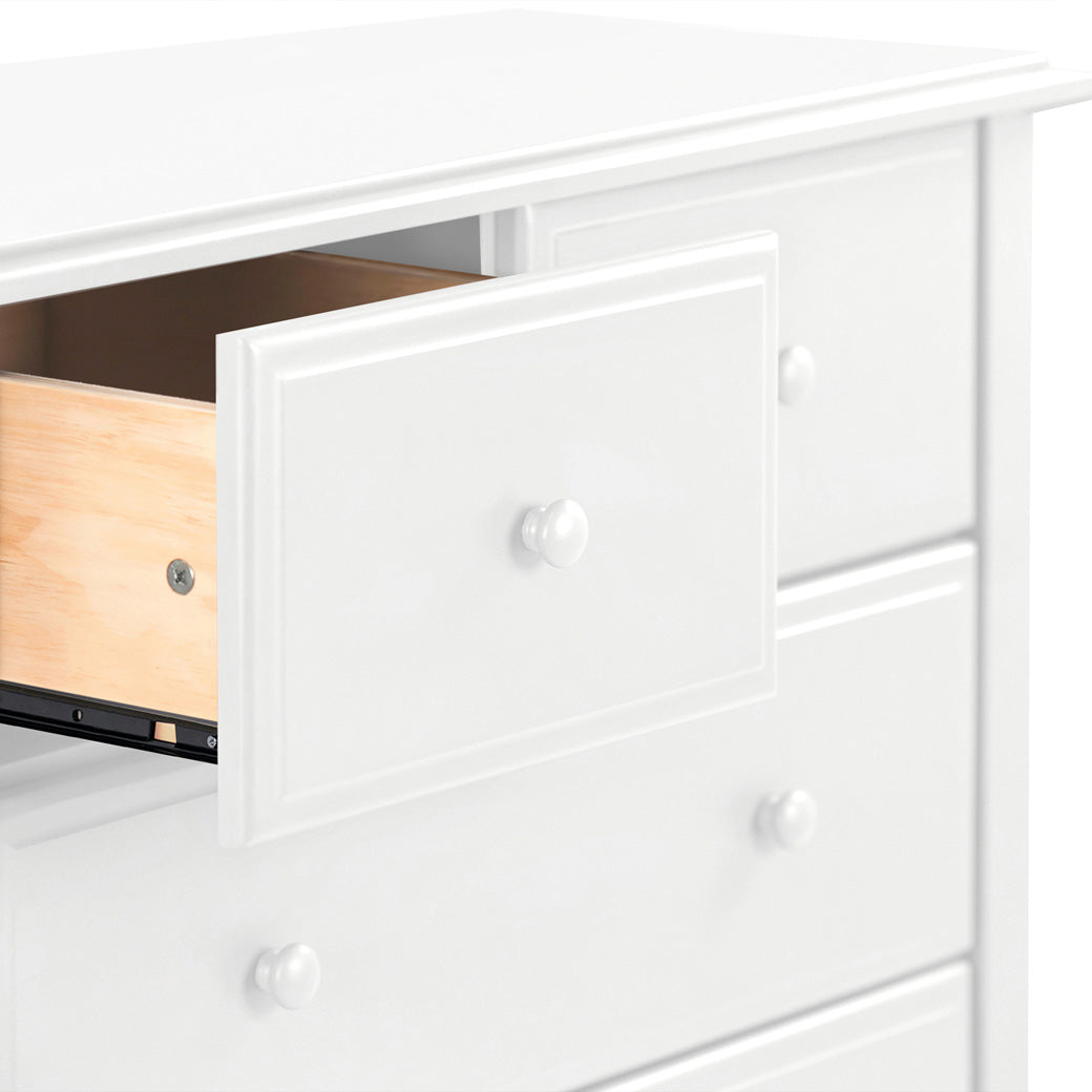 Closeup of the DaVinci Autumn 4-Drawer Dresser open drawer in -- Color_White