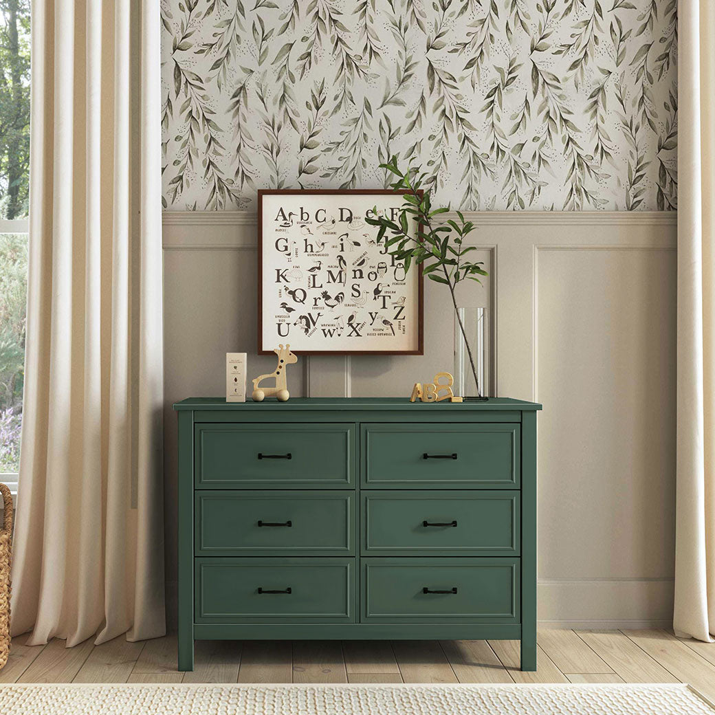 The DaVinci Charlie 6-Drawer Dresser in a room, front view  in -- Color_Forest Green