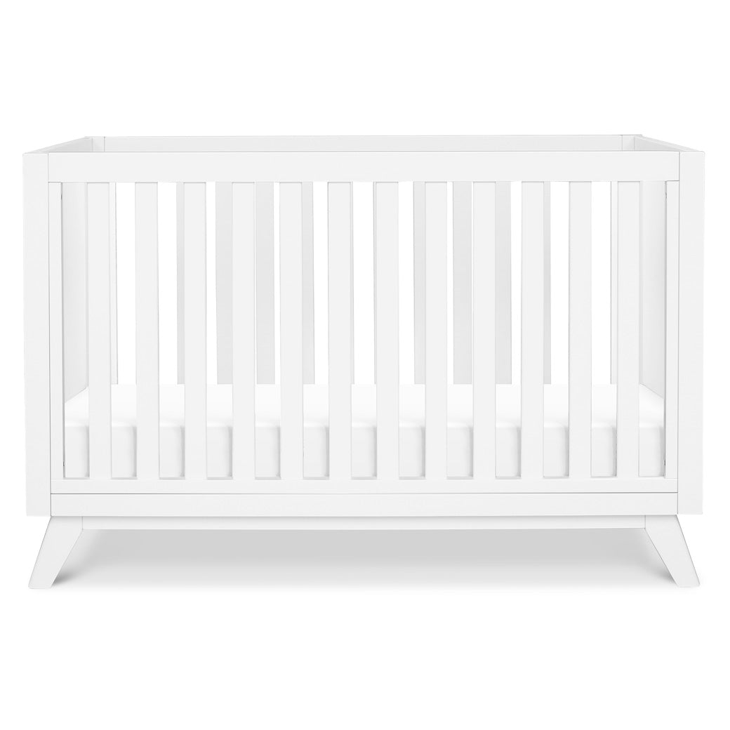 Front view of DaVinci Otto 3-in-1 Convertible Crib in -- Color_White _ Wood