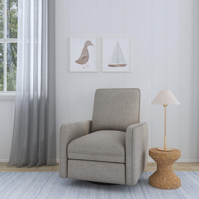 DaVinci's Penny Recliner And Swivel Glider next to a window and lamp in -- Color_Performance Grey Eco-Weave