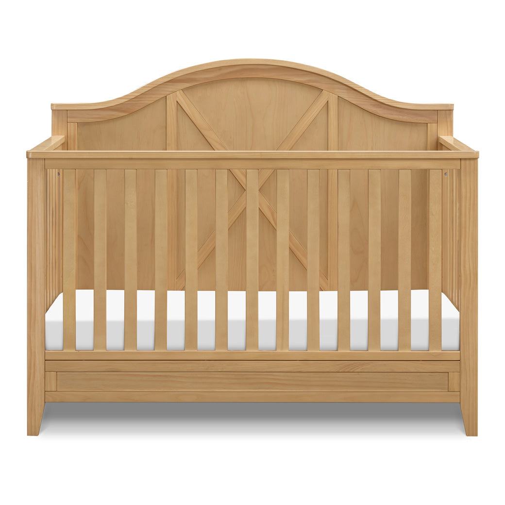 Front view of DaVinci Sawyer Farmhouse 4-in-1 Convertible Crib in -- Color_Honey