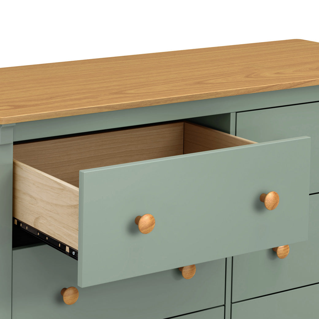 DaVinci Shea 6-Drawer Dresser with open drawer in -- Color_Light Sage/Honey