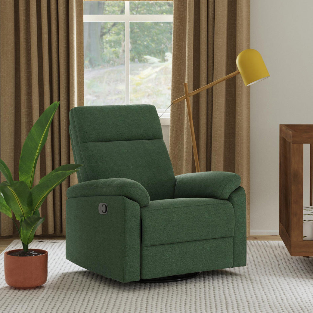 DaVinci Suzy Recliner and Swivel Glider next to lamp and plant  in -- Color_Pine Green