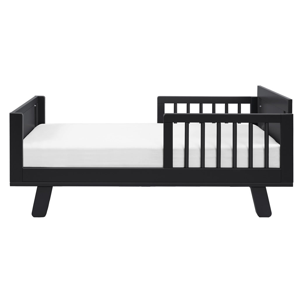 Side view of Junior Bed Conversion Kit For Hudson And Scoot Crib with mattress in -- Color_Black