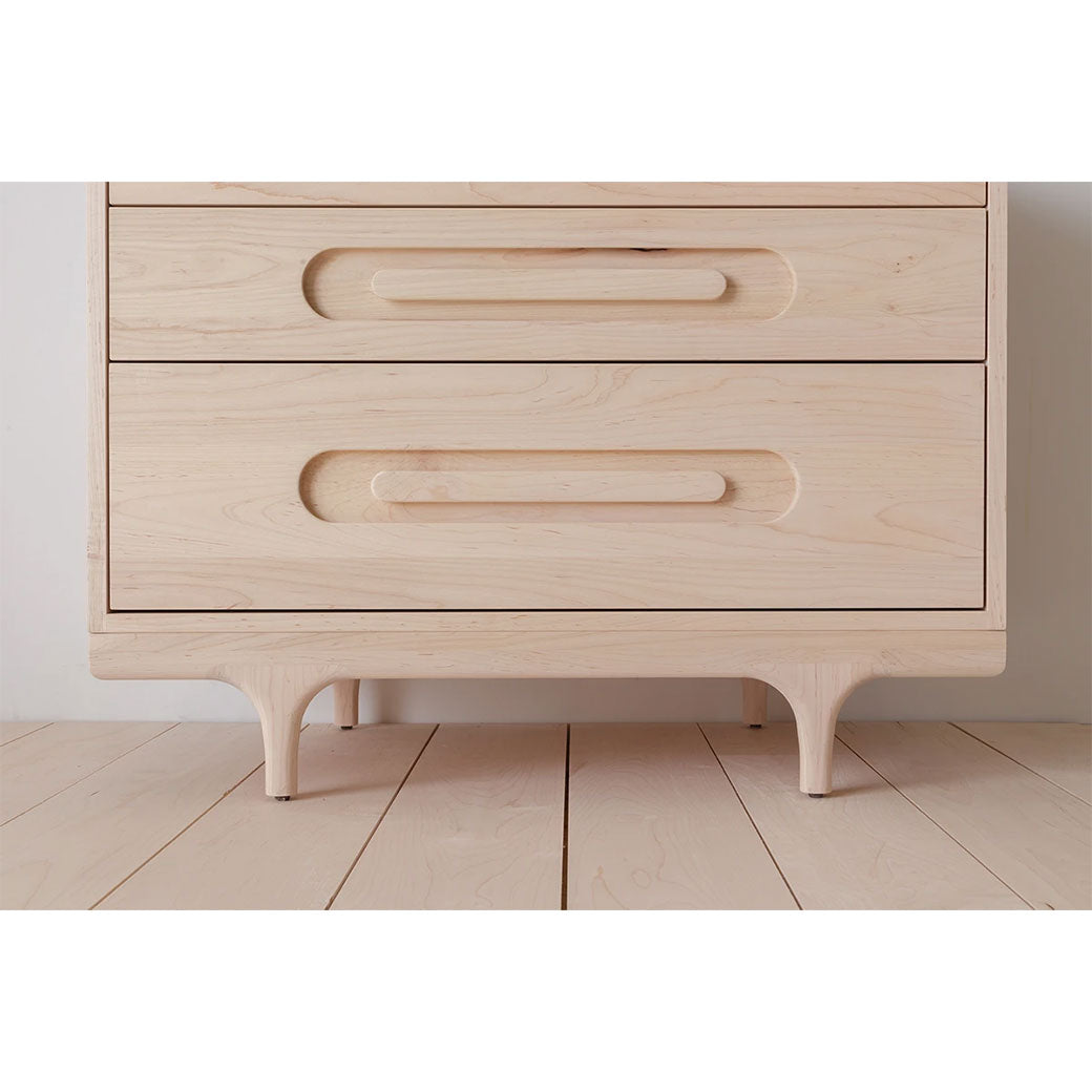 Closeup of the lower part of Kalon Caravan Dresser in -- Color_Oiled Ash