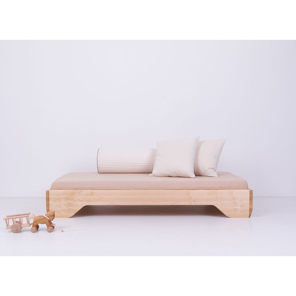 Kalon Echo Crib as platform daybed with pillows in -- Color_Salt