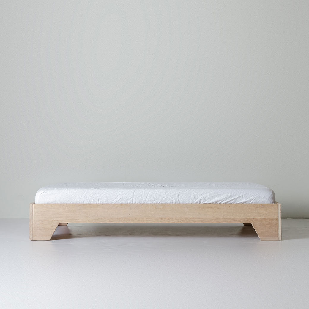 Front view of Kalon Io Crib as platform-style toddler bed -- Lifestyle