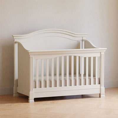 Namesake's Louis 4-in-1 Convertible Crib in a room in -- Color_Warm White