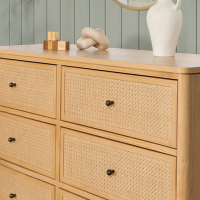 Namesake's Marin 6 Drawer Dresser with a vase and some items on it  in -- Color_Honey/Honey Cane