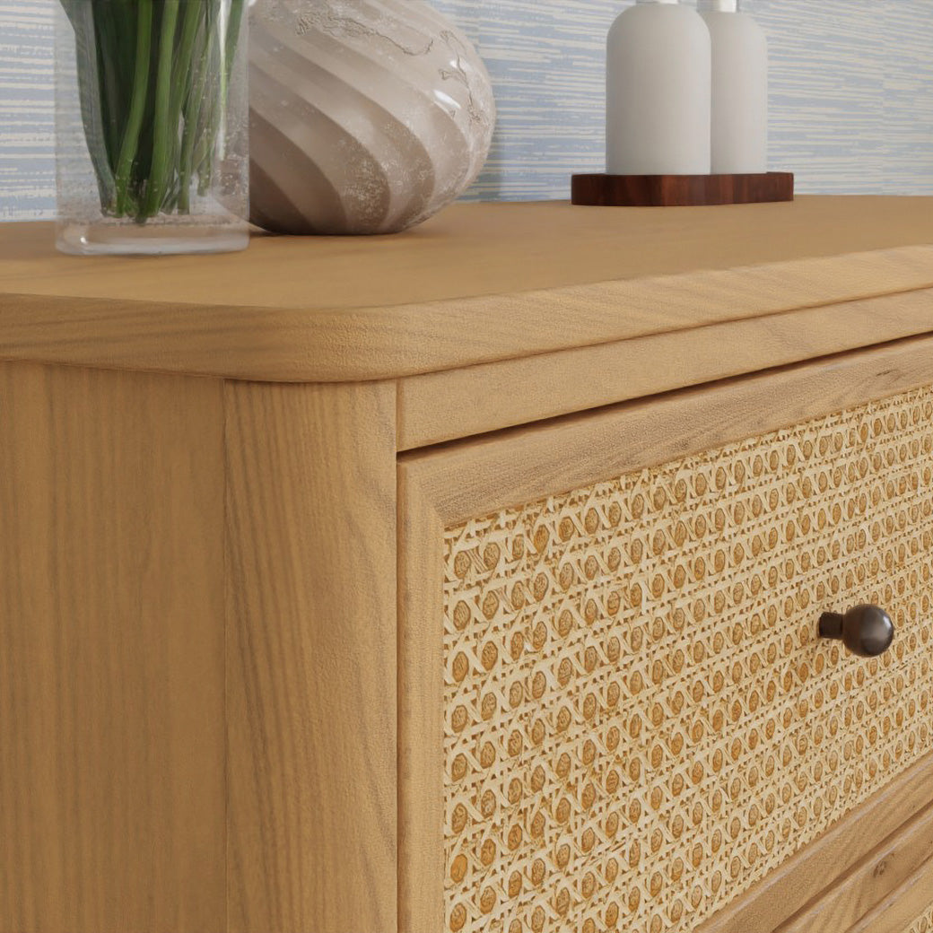 Closeup of the rounded corner of the Namesake's Marin 6 Drawer Dresser in -- Color_Honey/Honey Cane
