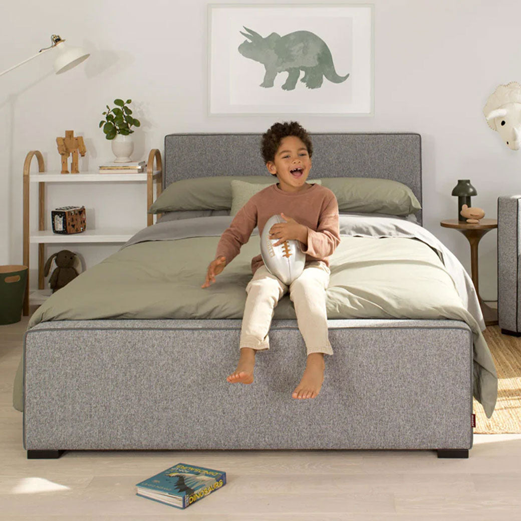 Monte Dorma Bed with boy with a toy on bed in -- Lifestyle