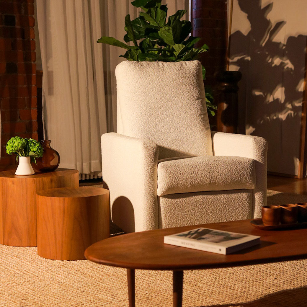 Monte Matera Glider Recliner next to coffee table and plant  in -- Lifestyle
