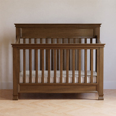 Front view of Namesake's Foothill 4-in-1 Convertible Crib in a room in -- Color_Mocha