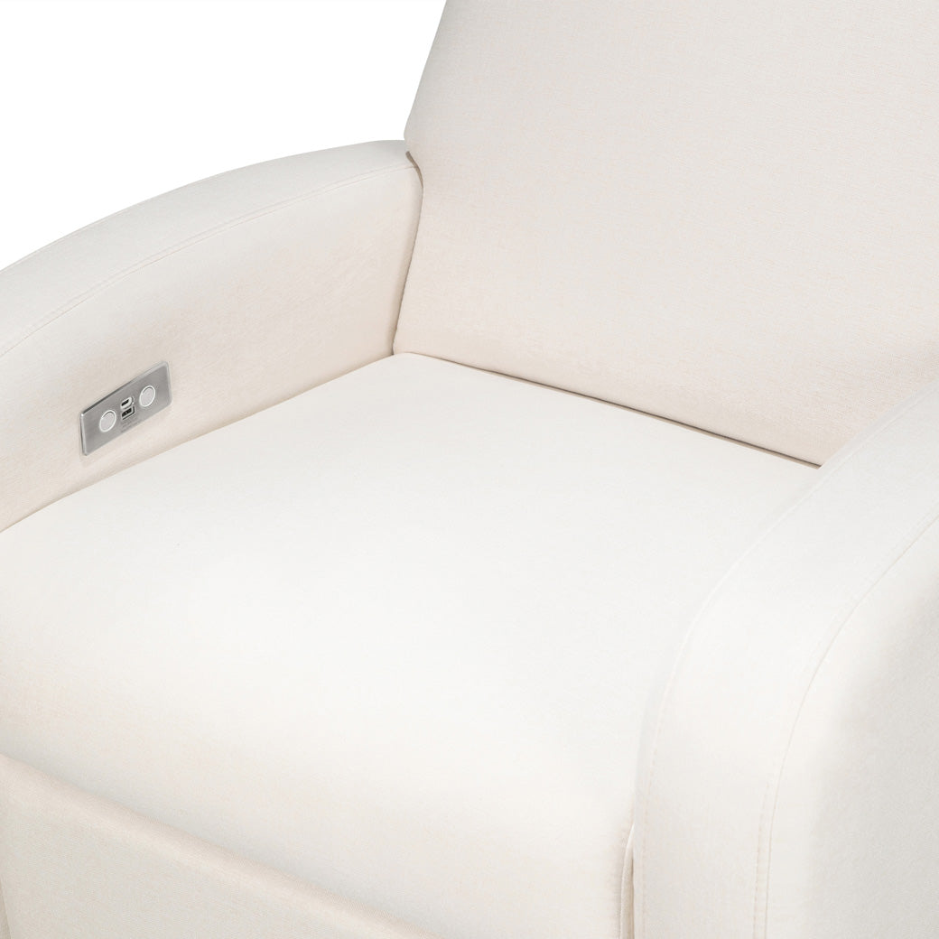 The Babyletto Nami Glider Recliner seat closeup  in -- Color_Performance Cream Eco-Weave With Light Base