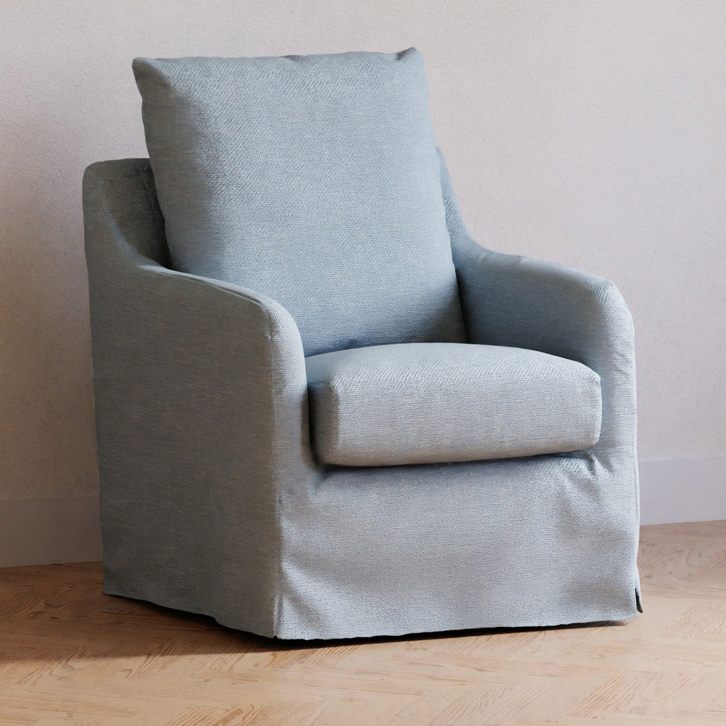 Namesake Reese Slipcover Swivel Glider in a laminated room -- Color_Chambray Eco-Linen