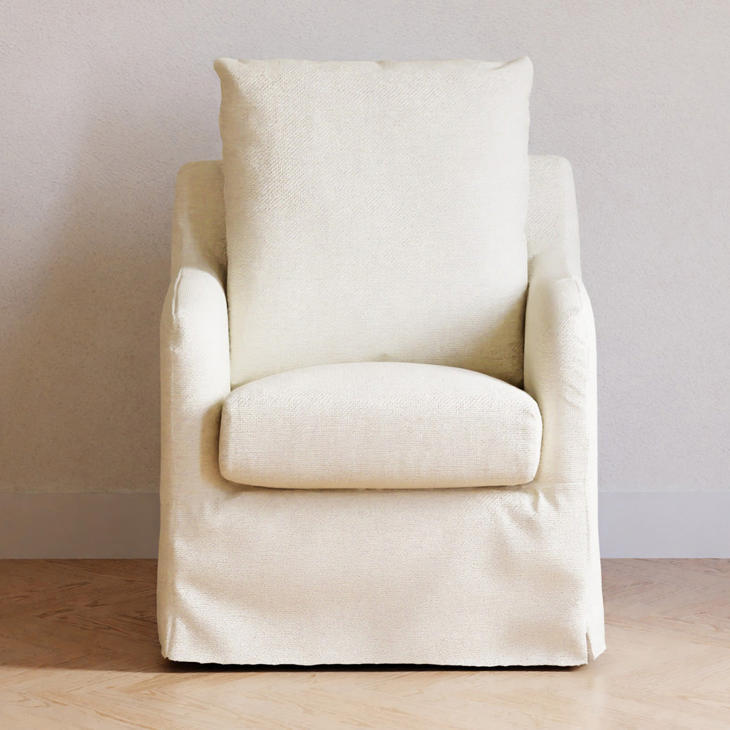 Front view of Namesake Reese Slipcover Swivel Glider in a laminated room  -- Color_Ivory Eco-Linen