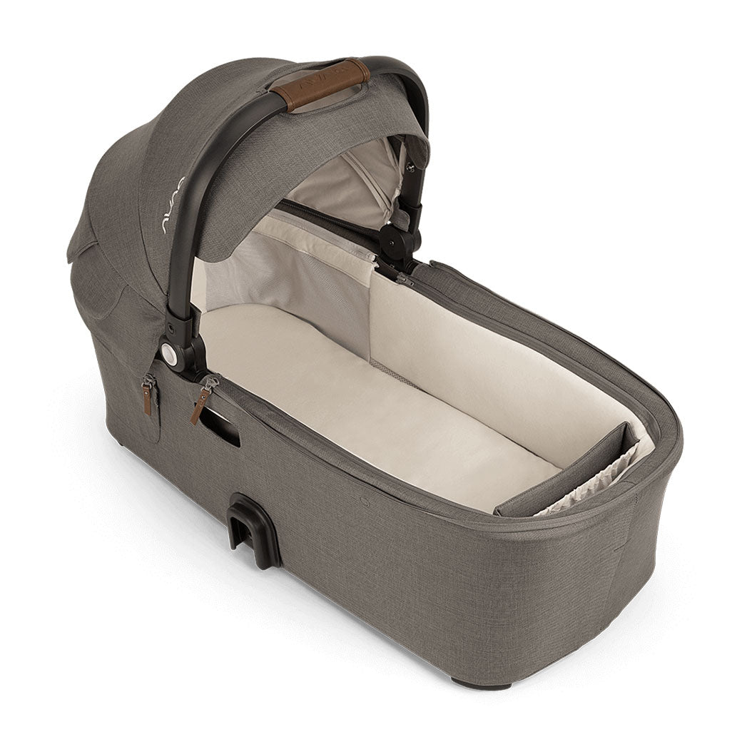 Slighty upper view of the Nuna DEMI Next Bassinet + Stand in -- Color_Granite