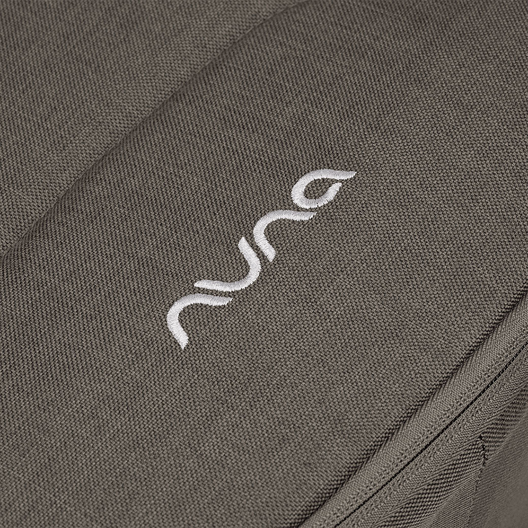 Closeup of the material of the Nuna DEMI Next Bassinet + Stand in -- Color_Granite