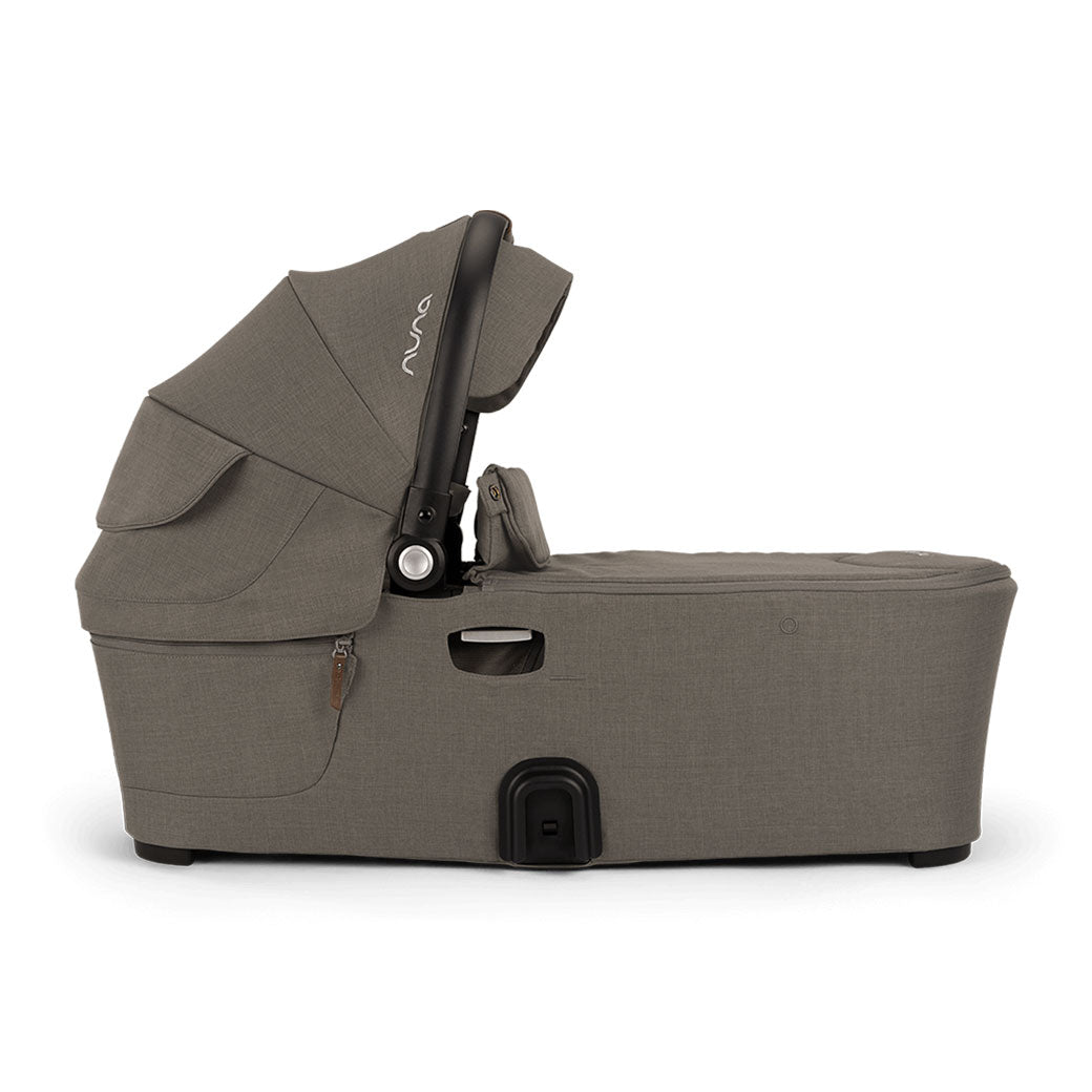 Side view of bassinet of Nuna DEMI Next Bassinet + Stand in -- Color_Granite